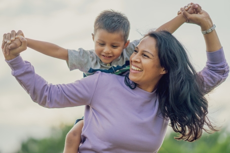 mother and son playing outside