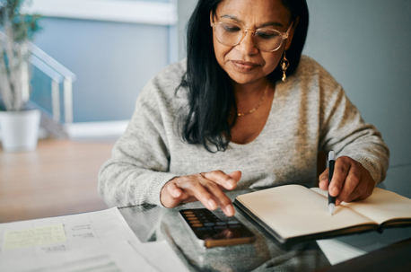 woman doing taxes at home