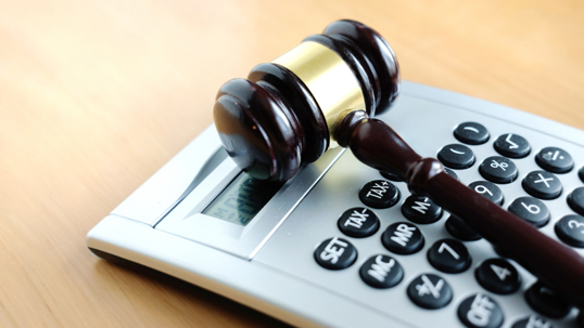 gavel and calculator